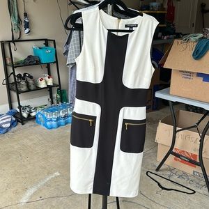 Black and white dress with gold zippers. Size 6